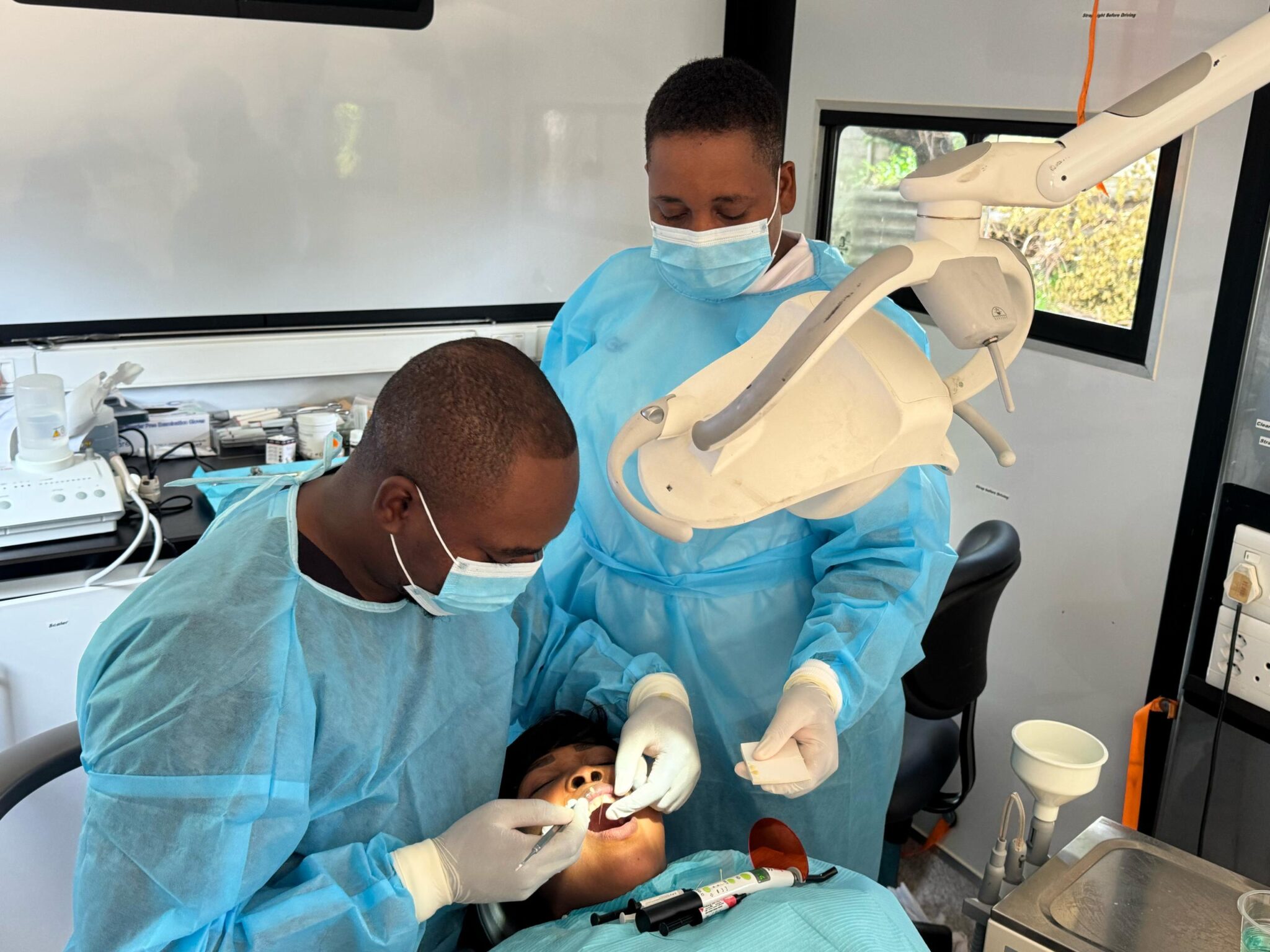 DR Alan Gura perforing a procedure on a patient at Chinotimba Clinic in Victoria Falls 3 2048x1536 1