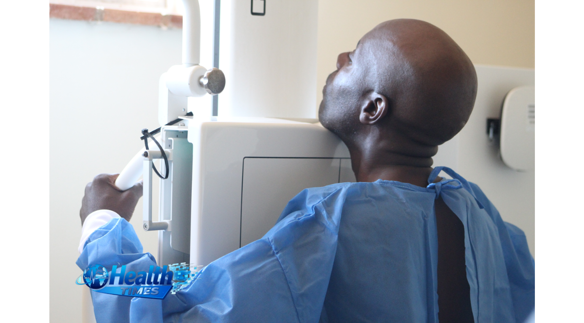 Male patient undergoing TB screening using a digital X-ray machine at Hauna District Hospital in Zimbabwe