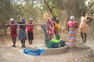 Pregnant women at Gokwe Hospital fetch water from a borehole in Zimbabwe.