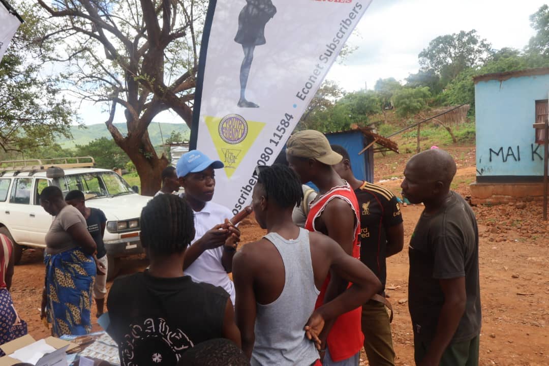 Men queue to access family planning and reproductive health services during a Zimbabwe National Family Planning Council outreach programme in Shamva District.