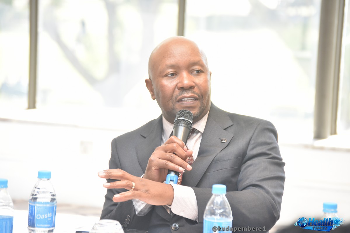 Dr Aspect Maunganidze, Permanent Secretary for Health and Child Care, addresses the Health Sector Working Group meeting in Harare.