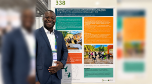 Douglas Jumbe of Bantwana Zimbabwe presents a poster on psychosocial support for peer supporters living with HIV during AIDS 2026 in Rio de Janeiro, Brazil.
