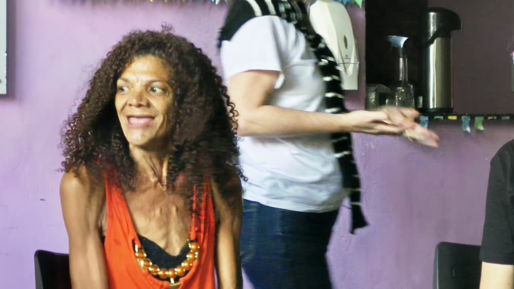 Lilian Leonel smiles at Espaço Normal, a harm reduction centre in Maré, Rio de Janeiro