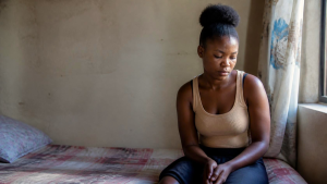 Young Zimbabwean woman representing the physical, emotional and social consequences of pregnancy after rape.