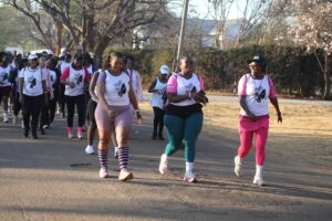 Women and girls march during the DatCitizen Not Her Choice Backpack Walk in Harare, Zimbabwe